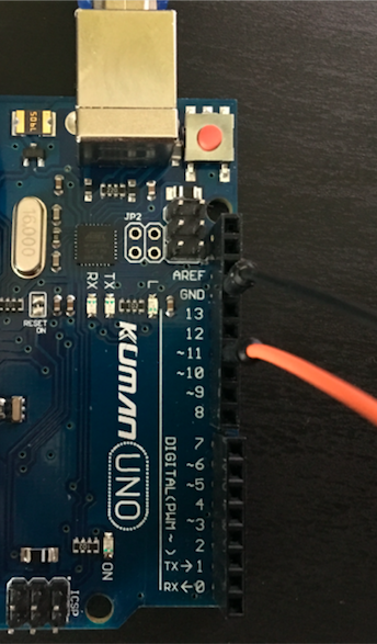 Arduino and two jump wire connected to pin 11 and ground pin